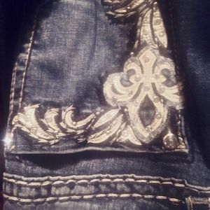 Miss Me jeans theres a 1 1/2 in. I had to sew. I loved these jeans.